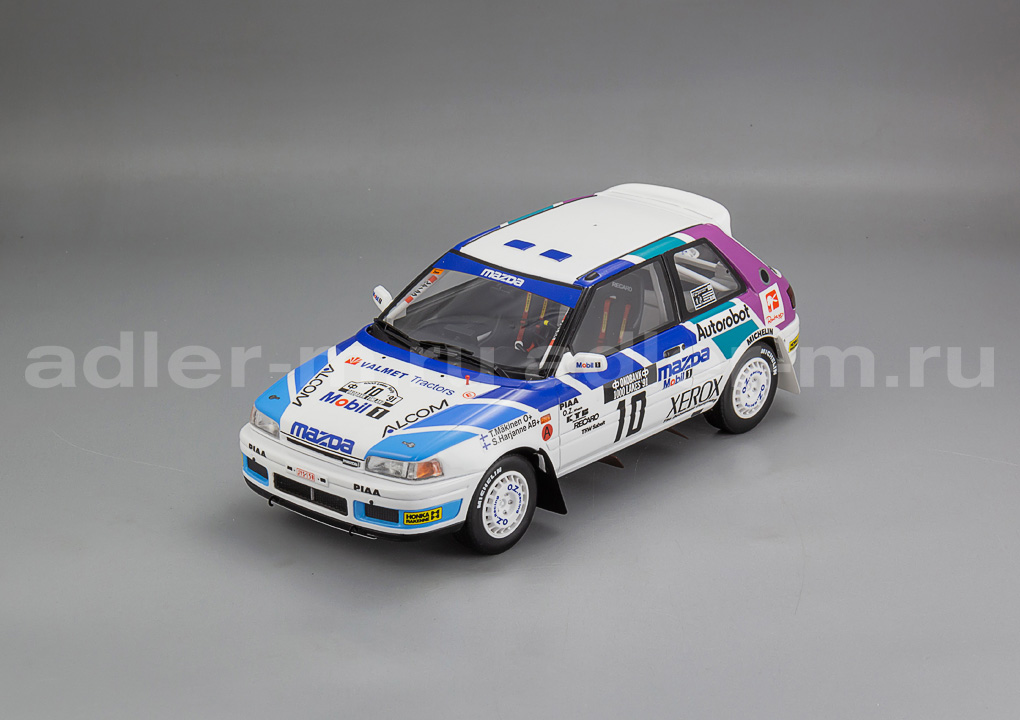 OTTO MOBILE 1:18 Mazda 323 GTX Gr.A #10 1000 Lakes Rally 1991 - T. Makinen OT1099